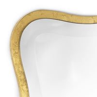 Candice gold leaf rectangle mirror with an undulating gilded frame and beveled edge.