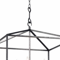 Cape Lantern Blackened Iron chandelier with geometric frame and candelabra lighting.