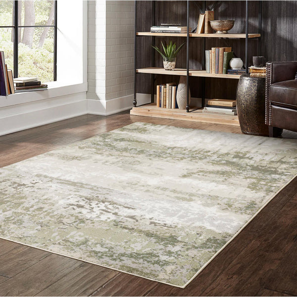 Caravan Beige & Green Contemporary Rug with a textured, multi-level surface in a living room setting.
