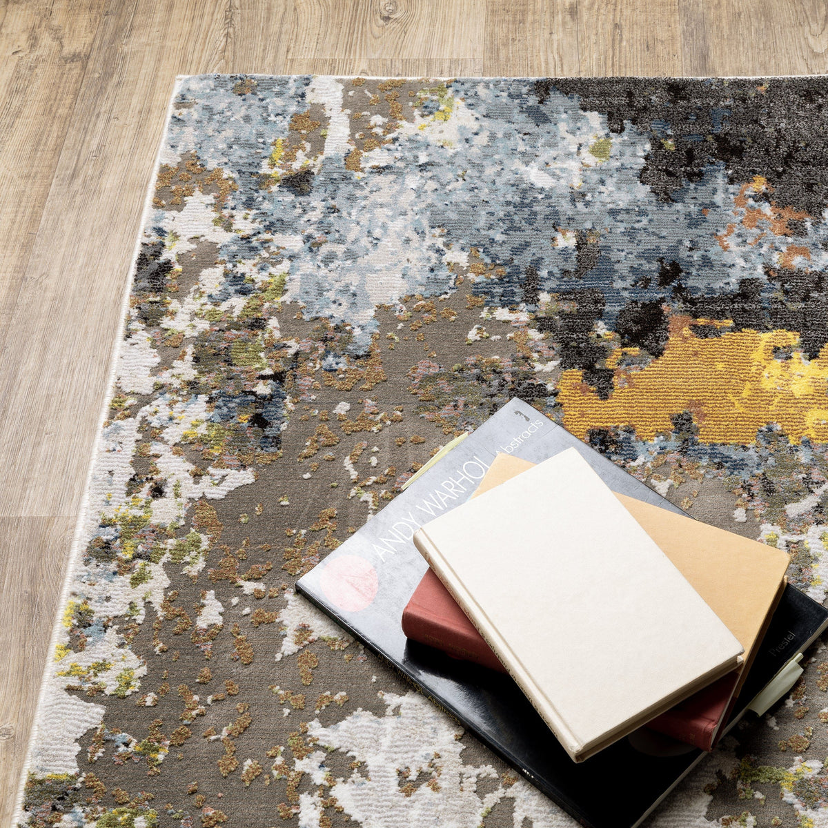 Caravan Charcoal Multi-Colored Contemporary Rug with textured polyester yarns, featuring warm and cool tones.