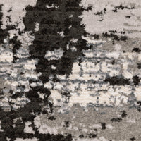 Close-up of a Caravan Grey & Black Contemporary Rug with textured, multi-level polyester pile.