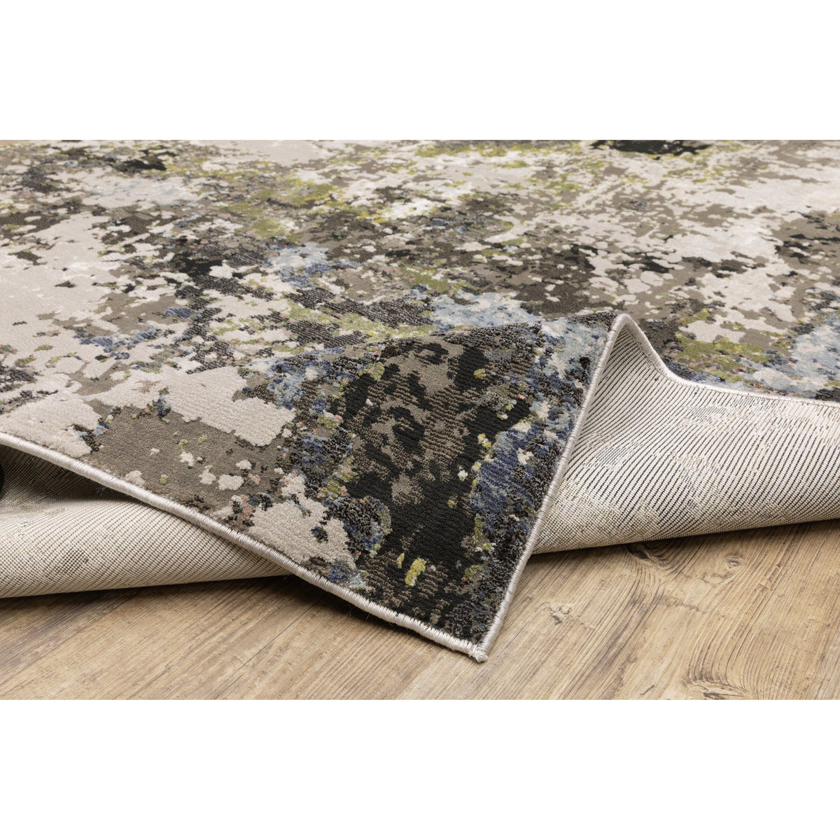 Caravan Grey & Moss Green Contemporary Rug with textured, multi-level surface and nature-inspired colors.