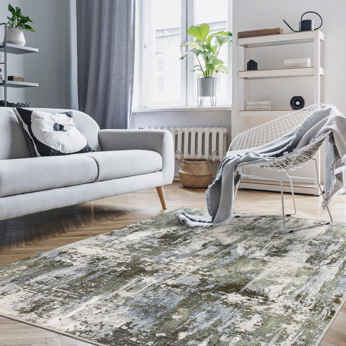 Caravan Moss Green & Blue Contemporary Rug with textured, multi-level surface in a modern living room.