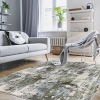 Caravan Moss Green & Blue Contemporary Rug with textured, multi-level surface in a modern living room.