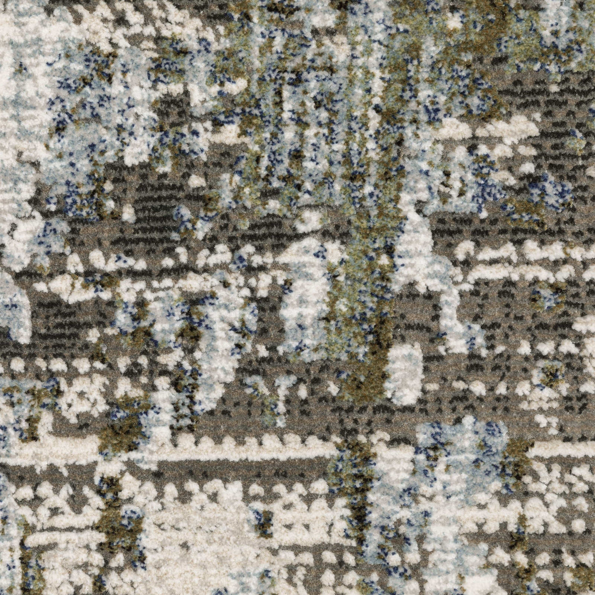 Caravan Moss Green & Blue Contemporary Rug with textured, multi-level surface and abstract design.