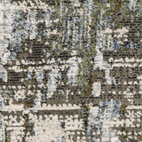 Caravan Moss Green & Blue Contemporary Rug with textured, multi-level surface and abstract design.