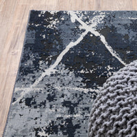 Caravan Multi-Blue Contemporary Rug with abstract design, space-dyed polyester, and a textured surface.