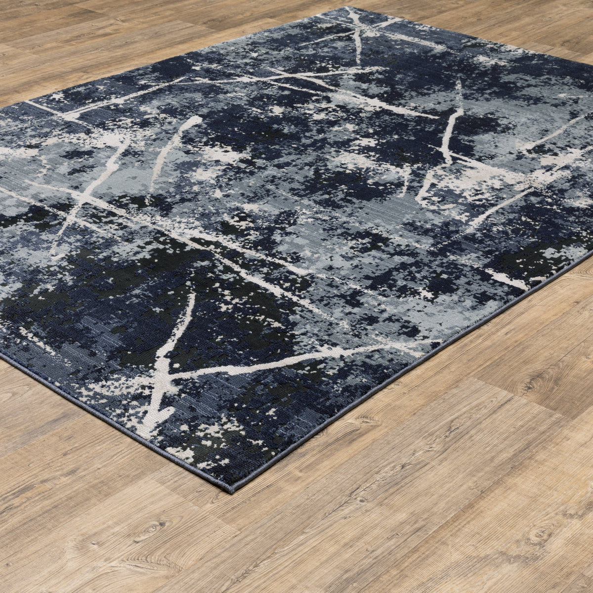 Caravan Multi-Blue Contemporary Rug with abstract white lines on textured space-dyed polyester.
