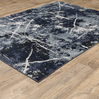 Caravan Multi-Blue Contemporary Rug with abstract white lines on textured space-dyed polyester.