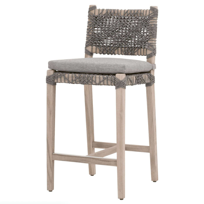 Gray rope and teak outdoor counter stool with a light gray cushion.