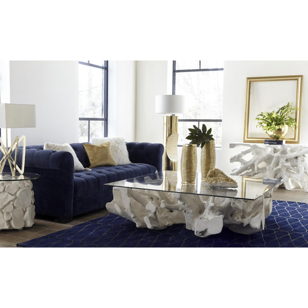 Off-white cast root coffee table with a glass top, featuring a natural, organic design.
