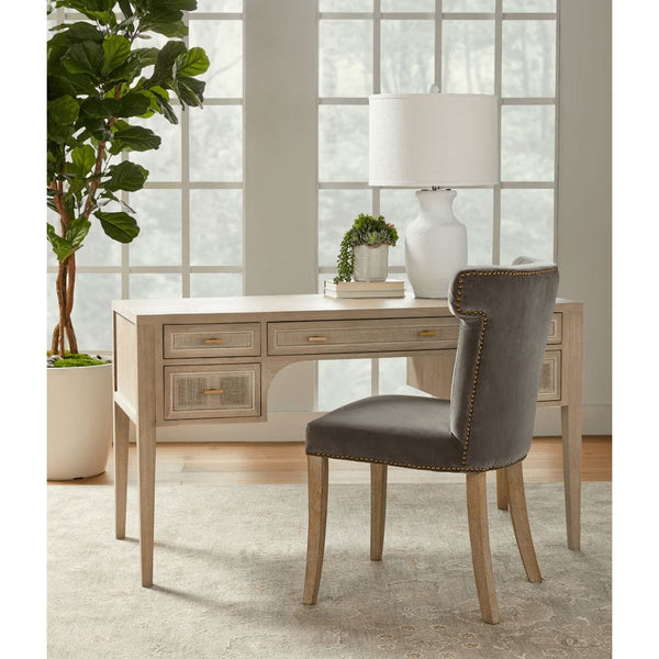 Celina Dark Dove Velvet Dining Chair with sculpted wingback design and dark gray velvet upholstery.