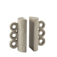Chandra Bookend Set: matte brown/grey, textured, paper mache-inspired, with three side rings.