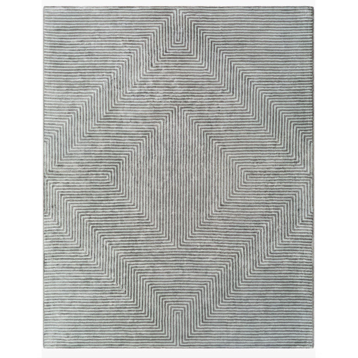 Charcoal grey and light grey striped viscose rug with a modern geometric hand-tufted design.