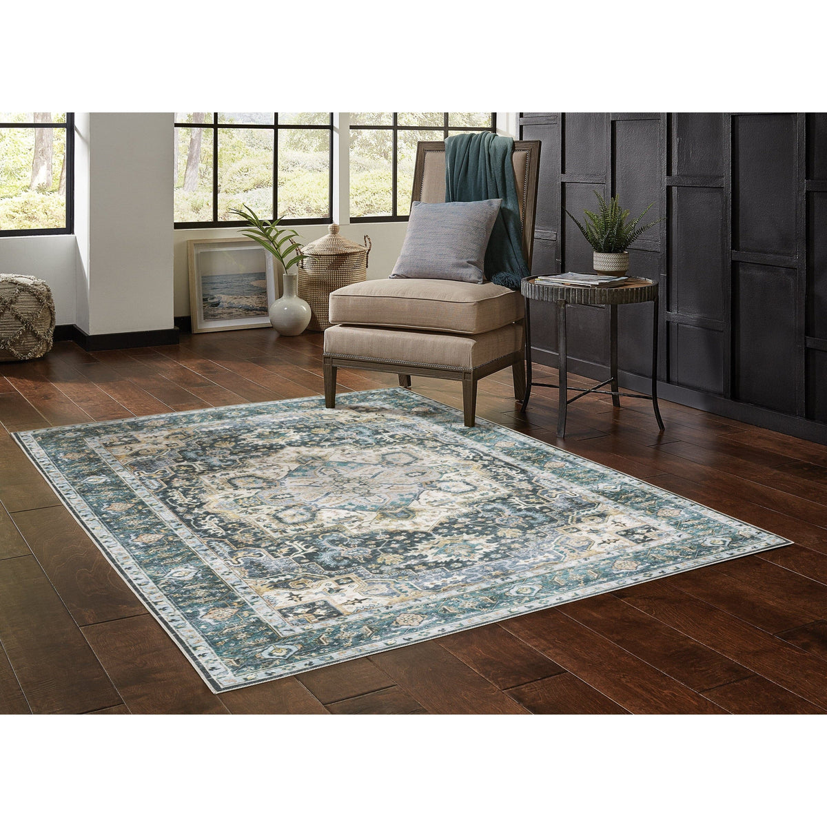 Charleston Blue & Ivory washable rug with distressed traditional design on a dark wood floor.