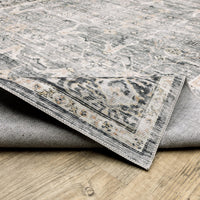 Charleston Charcoal & Grey washable rug with intricate pattern, non-slip backing, and blanket stitch finish.