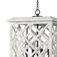 White Chatham Wood Lantern with a lattice pattern, blackened iron accents, and four candelabra bulbs.