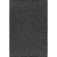 Charcoal gray braided polypropylene outdoor rug with no pile, perfect for coastal-inspired decor.