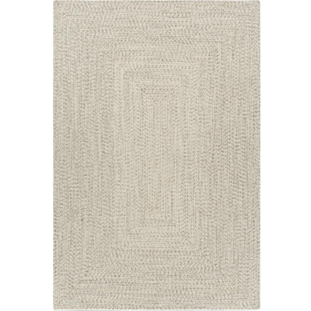 Cream braided polypropylene outdoor rug with a rectangular design.