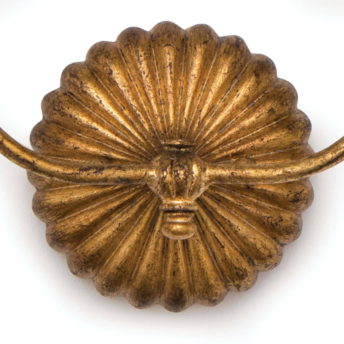Antique gold leaf double sconce with a ribbed, scalloped backplate.