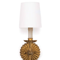 Antique gold leaf Clove sconce with a fluted backplate, candle-style bobeche, and white linen shade.
