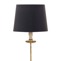 Elegant Clove Stem Buffet Table Lamp with antiqued gold base and black linen shade.