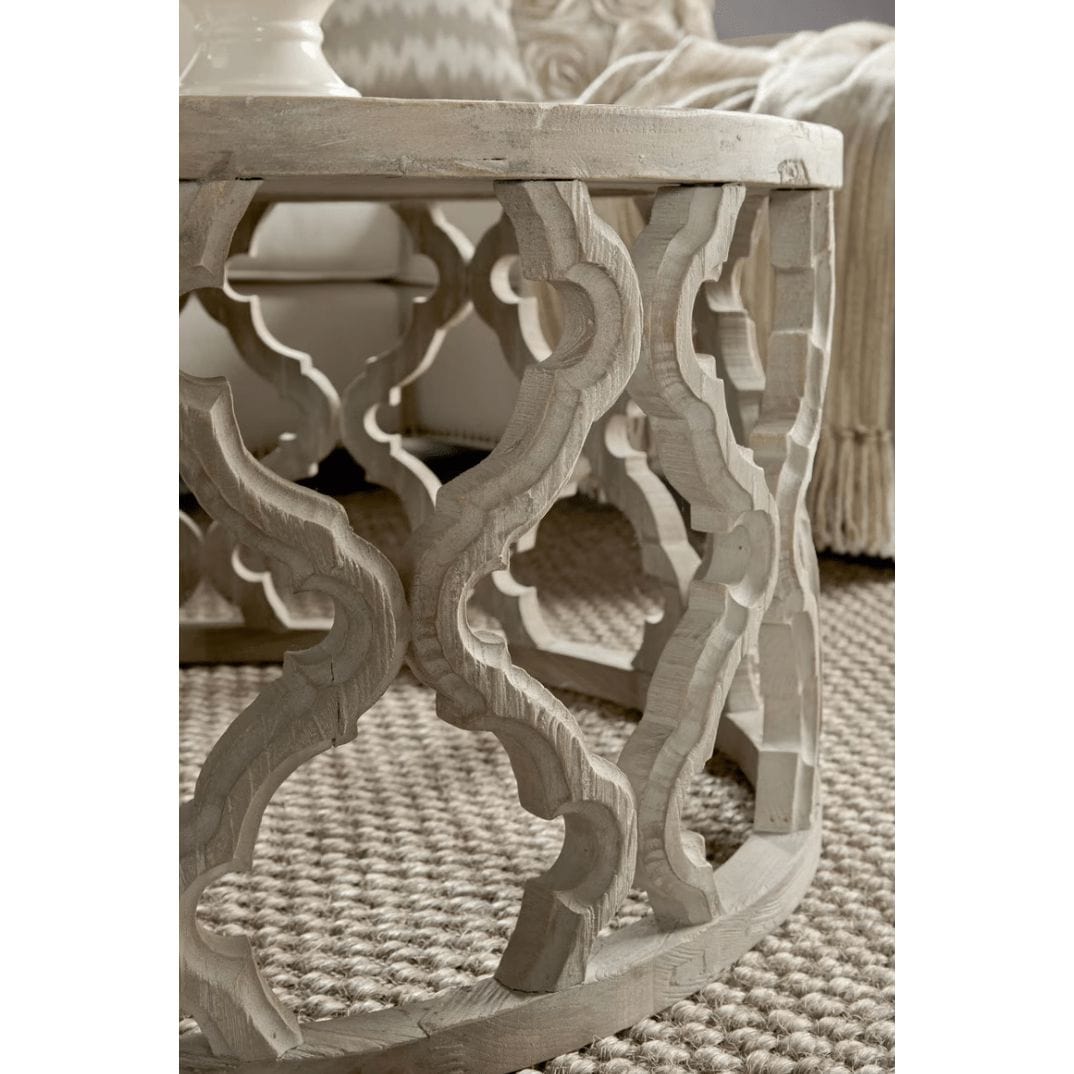 Clover reclaimed elm end table with smoke gray finish and quatrefoil-inspired carved base.