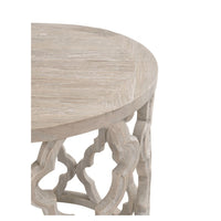 Clover reclaimed elm end table with smoke gray finish, round plank top, and quatrefoil carved base.