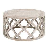 Round Clover reclaimed elm end table with smoke gray finish and quatrefoil carved base.