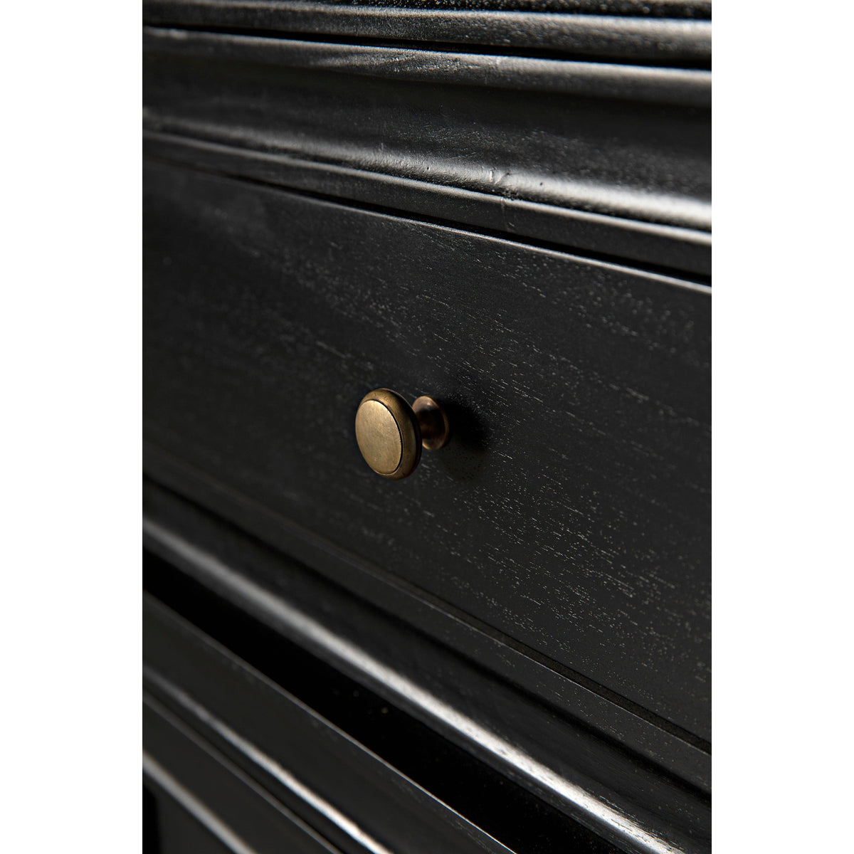 Close-up of a Colonial Hand Rubbed Black mahogany hutch with a brass knob and simple lines.
