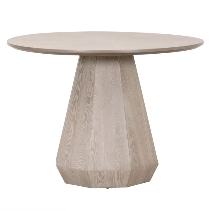 Connor 42" round dining table in grey ash wood with a unique faceted pedestal base.