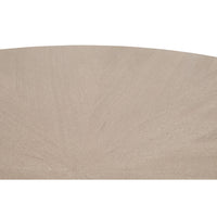 Connor 54" round dining table, natural gray ash wood with subtle starburst tabletop pattern.