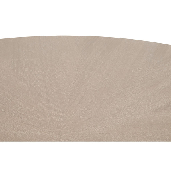 Connor 54" round dining table, natural gray ash wood with subtle starburst tabletop pattern.