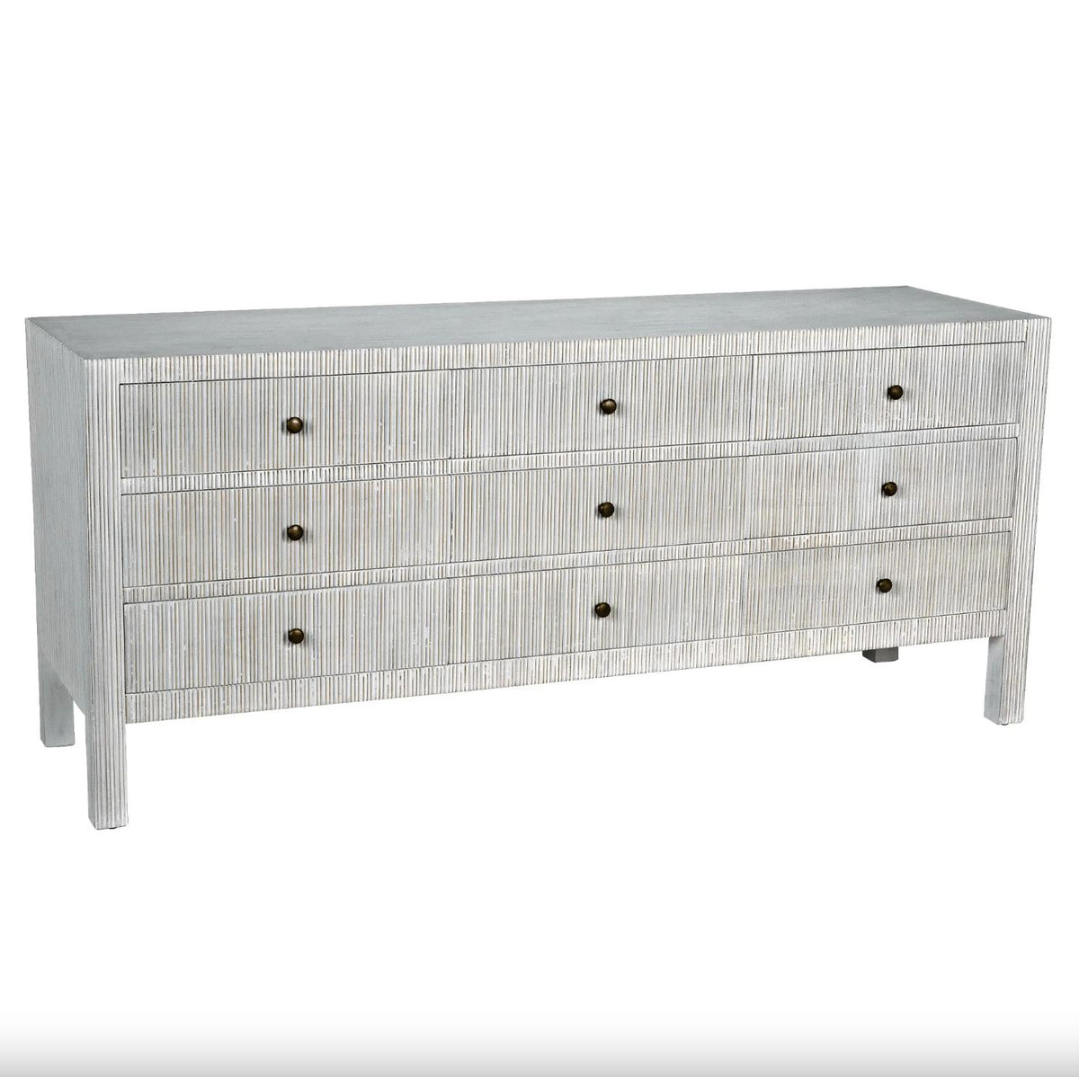 White solid mahogany 9-drawer dresser with vertical textured details and dark round pulls.