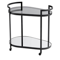 Black metal bar cart with two oval tempered glass shelves and wheels.