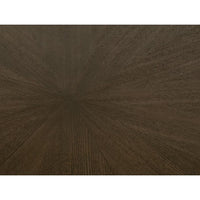 Coulter 54" burnished brown round dining table with a distinctive starburst wood grain pattern.