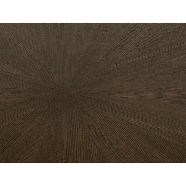 Coulter 54" burnished brown round dining table with a distinctive starburst wood grain pattern.