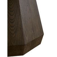 Close-up of Coulter Burnished Brown Round Dining Table's octagon pedestal base with wood grain.