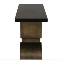 Sleek Coutura console table with matte black top and aged brass industrial steel base.