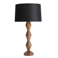 Mid-century modern Crew Buffet Lamp with a geometric walnut wood base and a black linen shade.