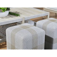 Light gray woven rope ottoman accent cube with a teak wood frame.
