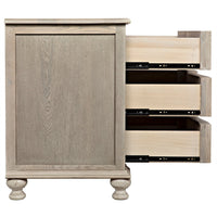 Vintage gray solid elm 3-drawer chest with curved front, turned ball feet, and open drawers revealing metal runners.