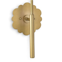 Daisy Sconce with a natural brass daisy-shaped backplate and vertical brass arm.