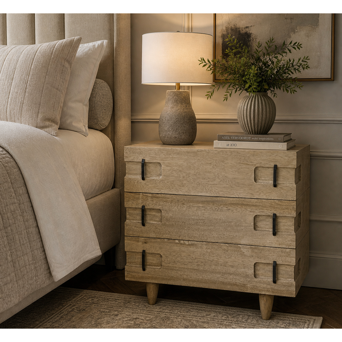 David Walnut Side Table in Washed Walnut, a rustic three-drawer chest with black metal pulls and tapered legs.