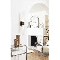 Daylon Horn Small: Matte natural horn sculpture on a brass base, 15" tall, in a chic living room.