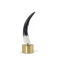 Daylon Small Horn sculpture with matte black and white natural horn on a round brass base.