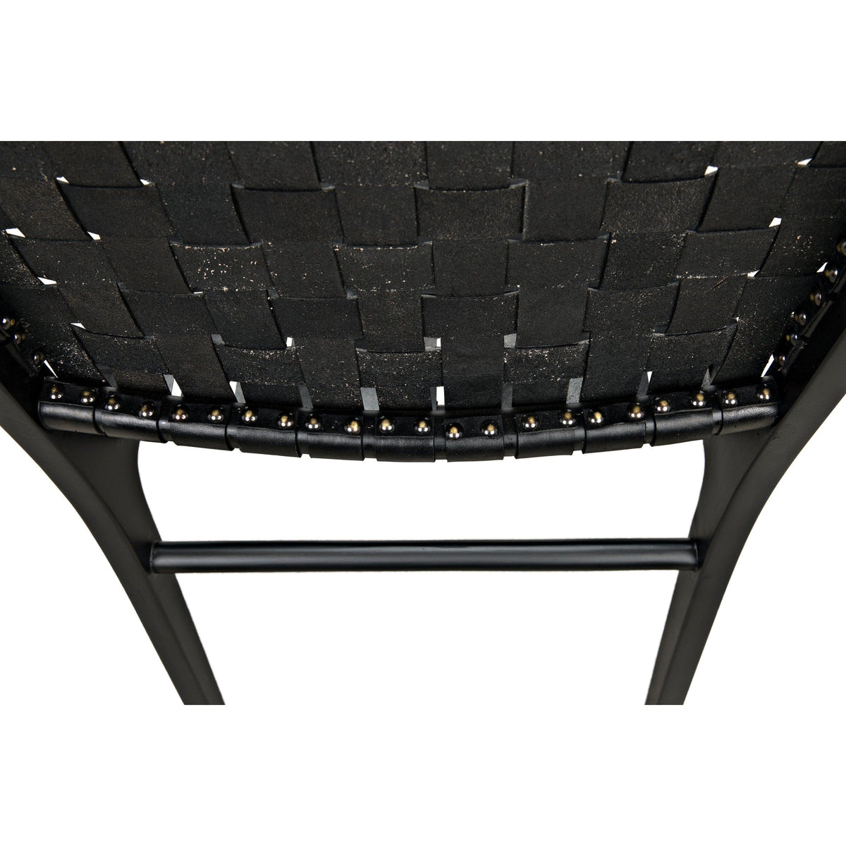 Dede Black Leather Dining Chair with handwoven leather seat and slim, tapered teak legs.
