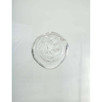 Clear glass medallion with a subtle copper stripe, a key detail for the Demi John Table Lamp.