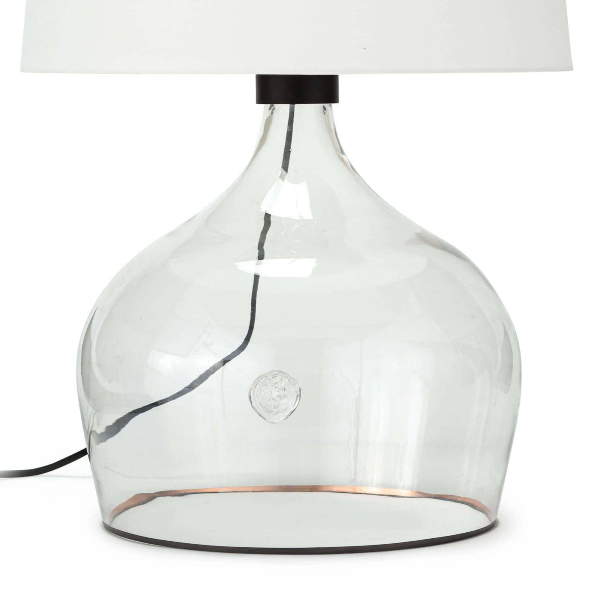 Large Demi John table lamp with a clear glass vessel base, copper stripe, and white linen shade.