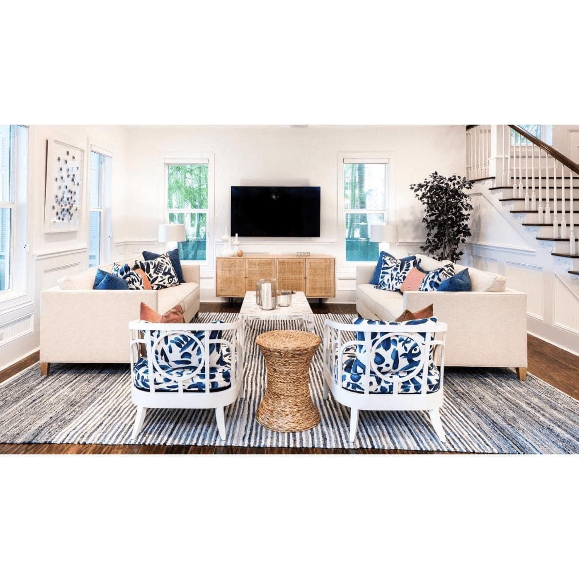 Denim cotton hand-woven rug with blue and white stripes in a coastal living room.